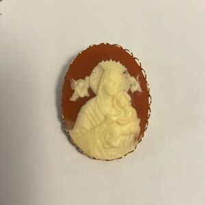 Vtg gold tone Blessed Mother cradling Baby Jesus cameo